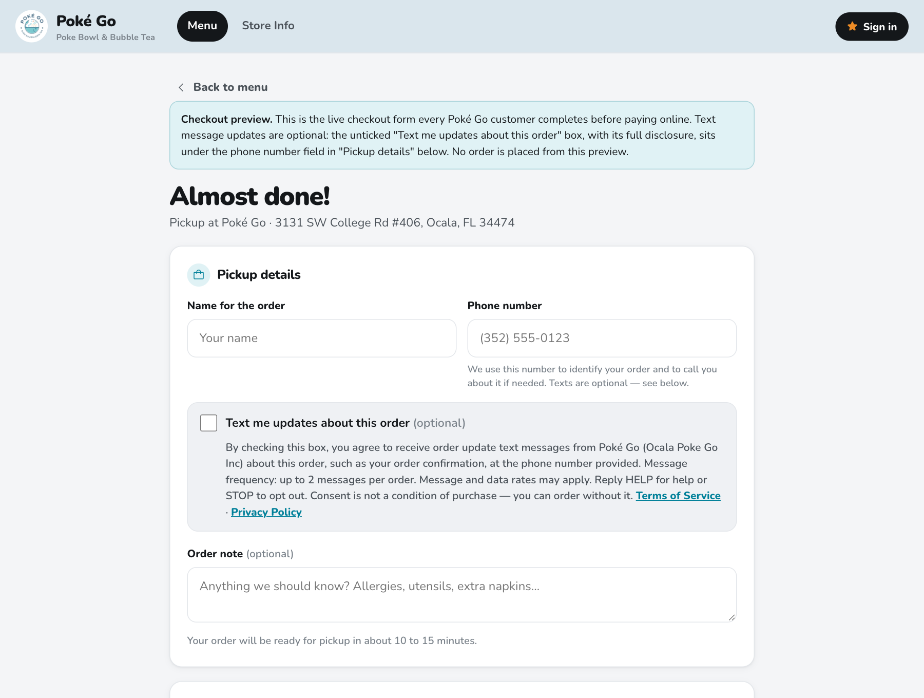 The pokegoapp.com checkout: the phone number field with the optional, unticked 'Text me updates about this order' box and its full disclosure beneath it
